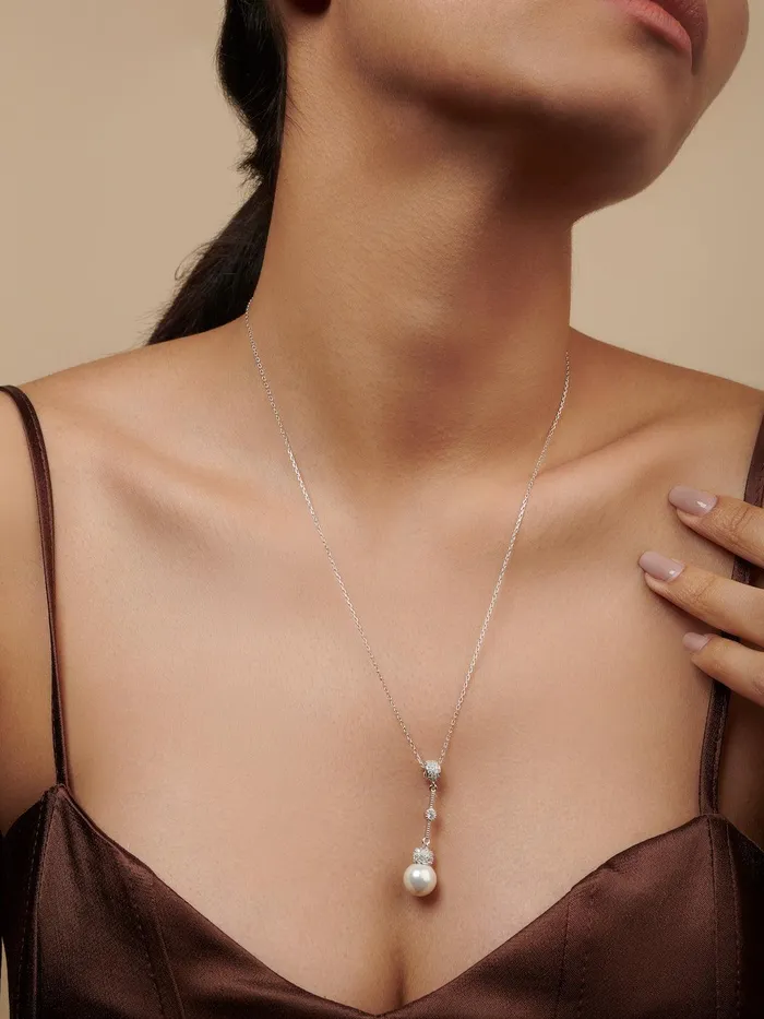 Curio Cottage Earrings Pure Silver Streak Of Pearl Drop Necklaces Embellished With Cubic Zirconia Stones Curio Cottage Earrings Pure Silver Streak Of Pearl Drop Necklaces Embellished With Cubic Zirconia Stones