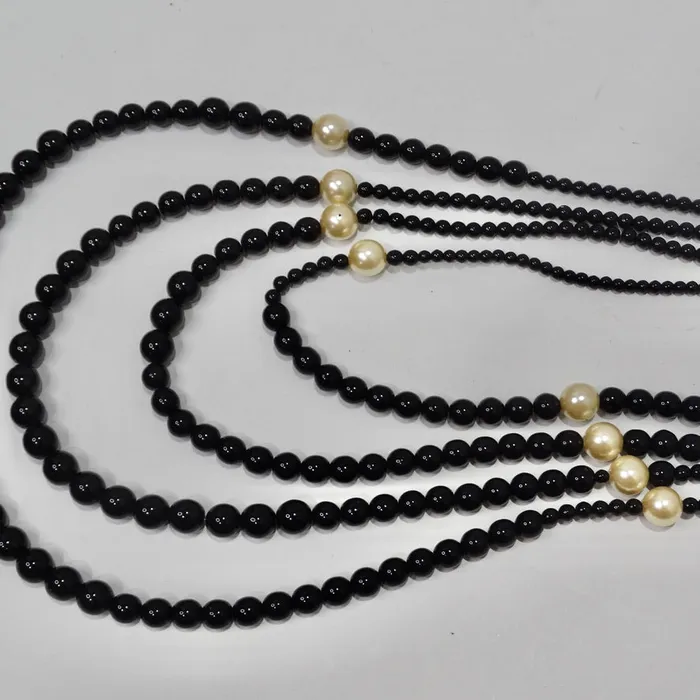 Necklaces Vintage by Misty Chanel 2010 Black and Ivory Resin Pearl Multi Strand CC Logo Necklace