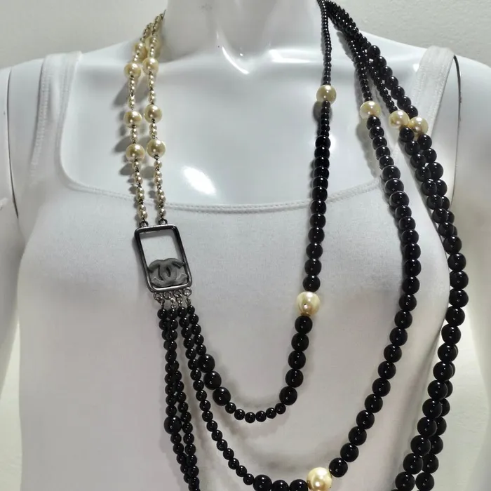 Necklaces Vintage by Misty Chanel 2010 Black and Ivory Resin Pearl Multi Strand CC Logo Necklace