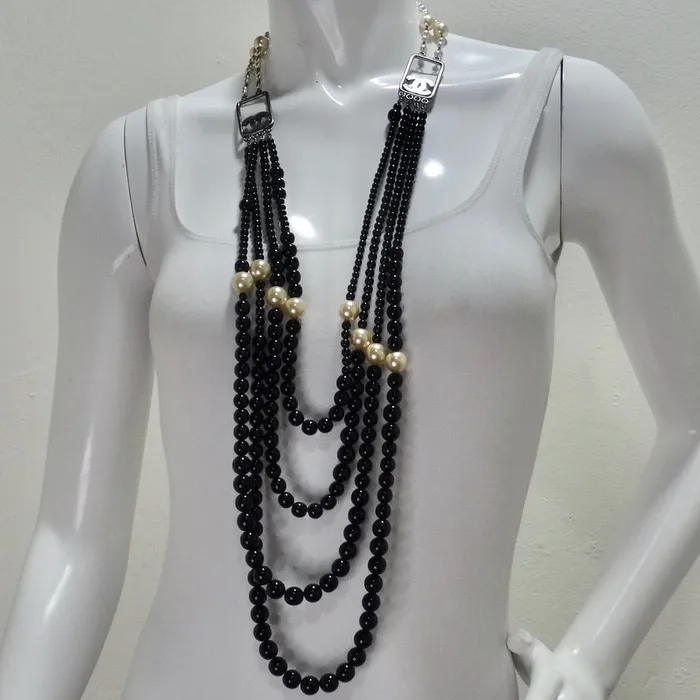 Necklaces Vintage by Misty Chanel 2010 Black and Ivory Resin Pearl Multi Strand CC Logo Necklace