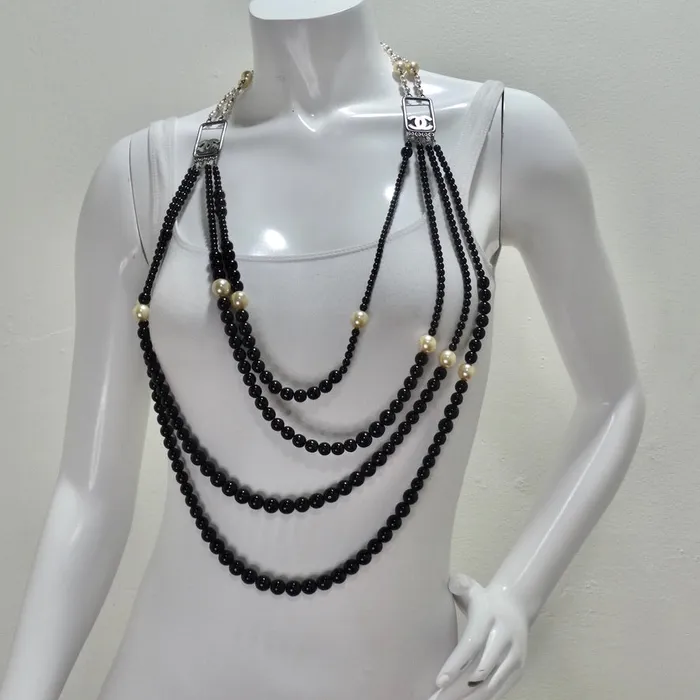 Necklaces Vintage by Misty Chanel 2010 Black and Ivory Resin Pearl Multi Strand CC Logo Necklace