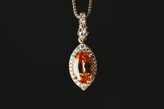 Stanton Necklaces 14k Yellow Gold Marquise Spessartite Garnet and Diamond Pendant