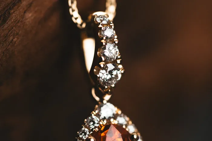 Stanton Necklaces 14k Yellow Gold Marquise Spessartite Garnet and Diamond Pendant
